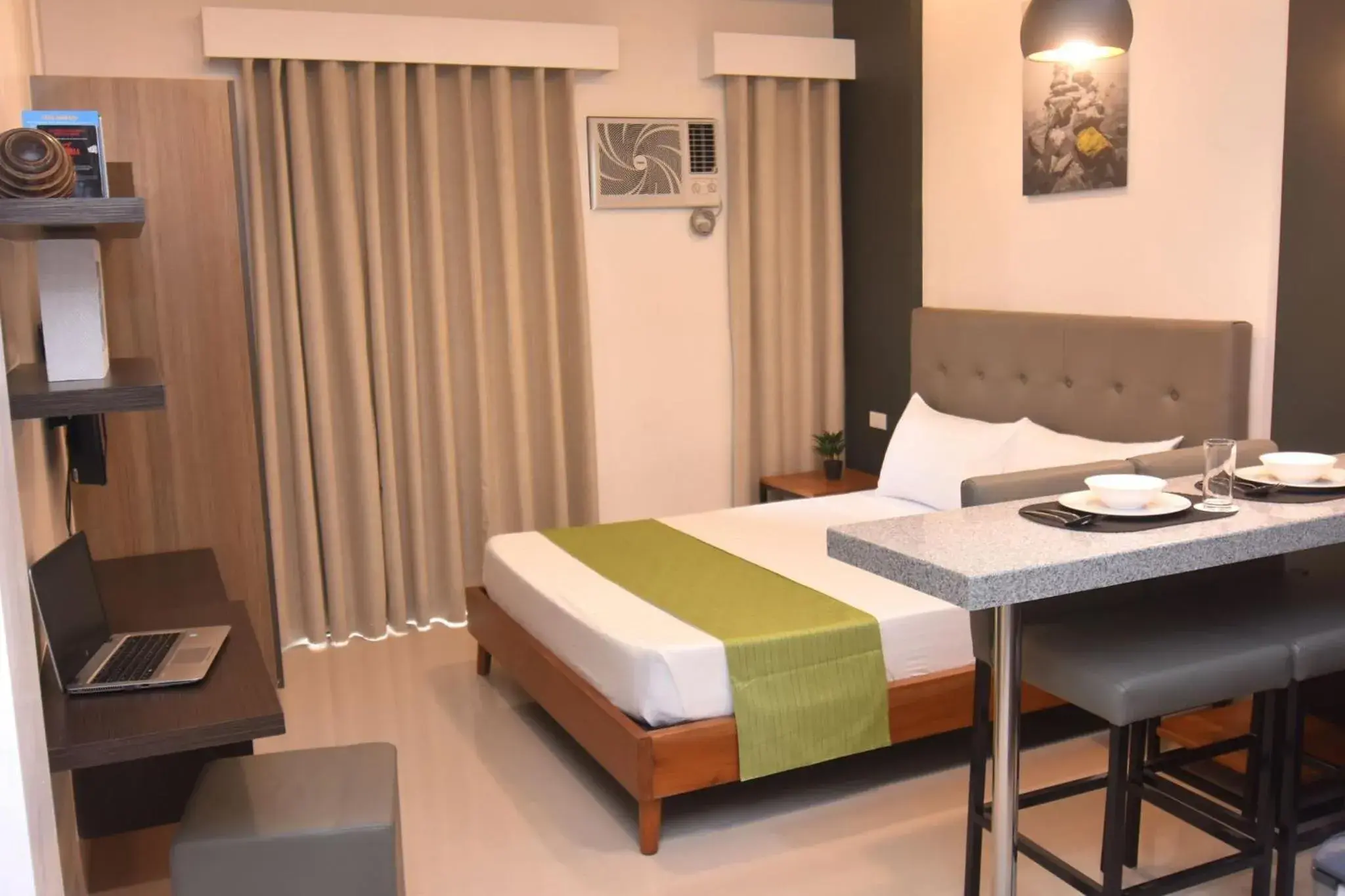 Bed in Andeo Suites